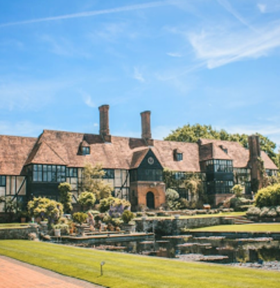 Sprawling country house set in beautiful gardens with a pond