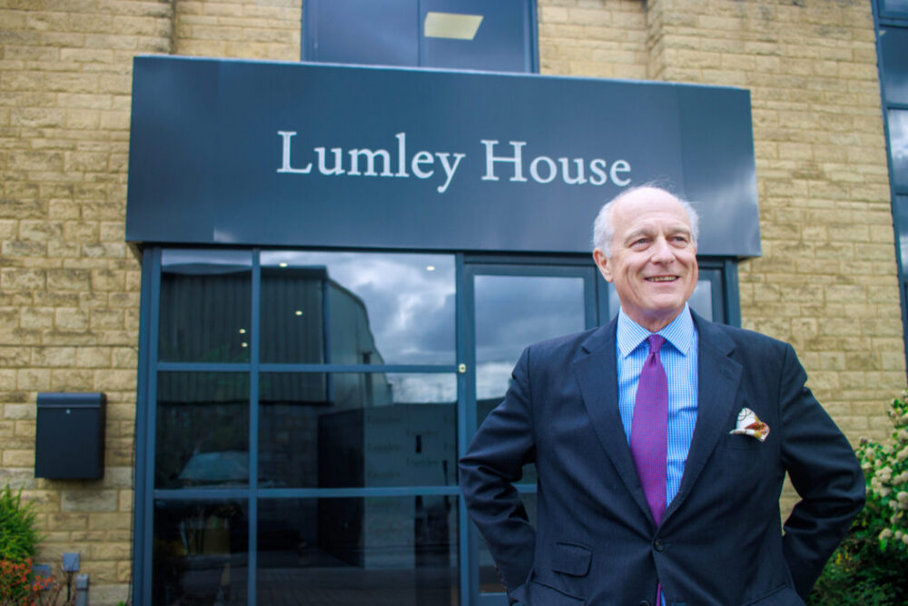 John Lumley outside Cirencester office